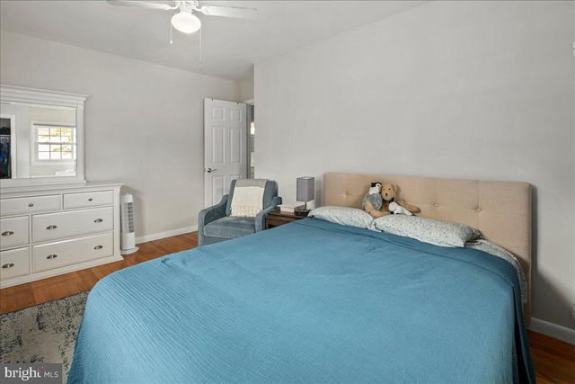 a bedroom with a bed and closet