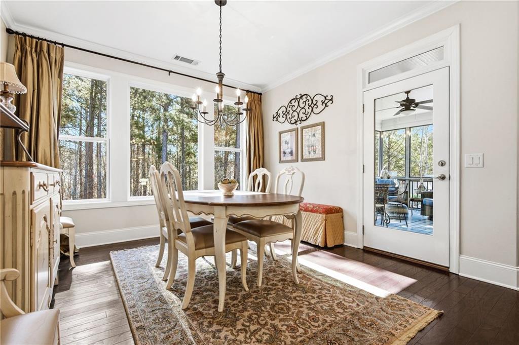91 Bellwind Lane Dallas, GA 30132 - Photo 17 of 44 a view of a dining room with furniture window and wooden floor