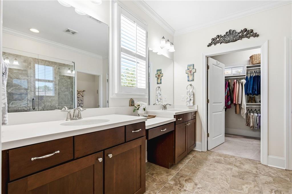 91 Bellwind Lane Dallas, GA 30132 - Photo 24 of 44 a view of a kitchen island a sink and cabinets