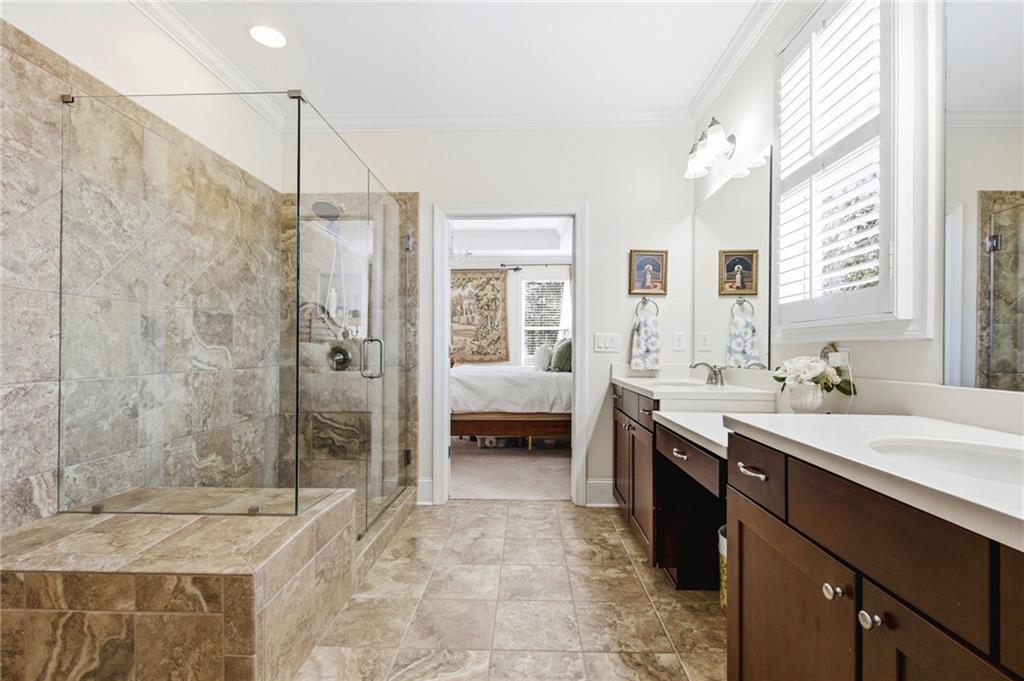 91 Bellwind Lane Dallas, GA 30132 - Photo 27 of 44 a spacious bathroom with a tub sink and shower