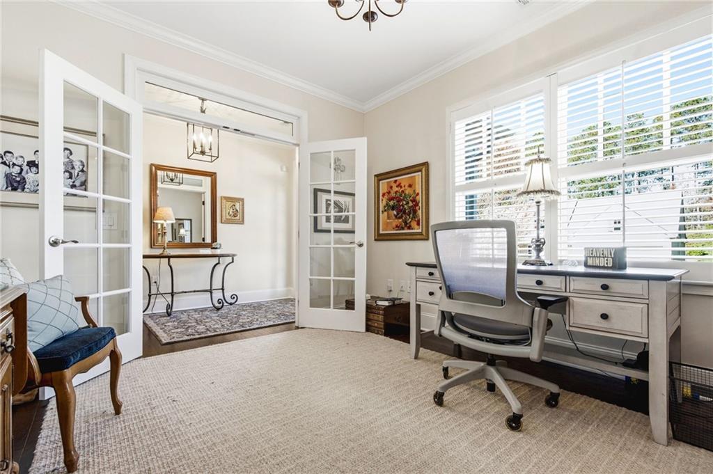 91 Bellwind Lane Dallas, GA 30132 - Photo 5 of 44 a view of a workspace with furniture and a window