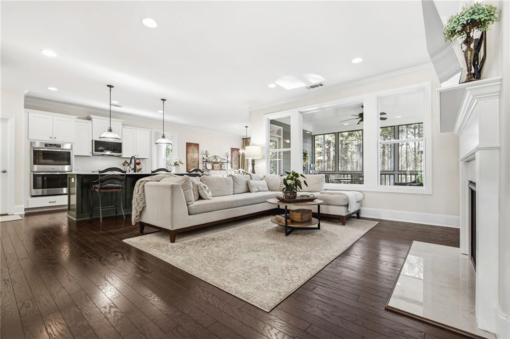 91 Bellwind Lane Dallas, GA 30132 - Photo 6 of 44 a living room with furniture and a wooden floor