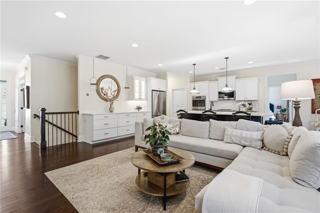 91 Bellwind Lane Dallas, GA 30132 - Photo 9 of 44 a living room with furniture a rug and white walls