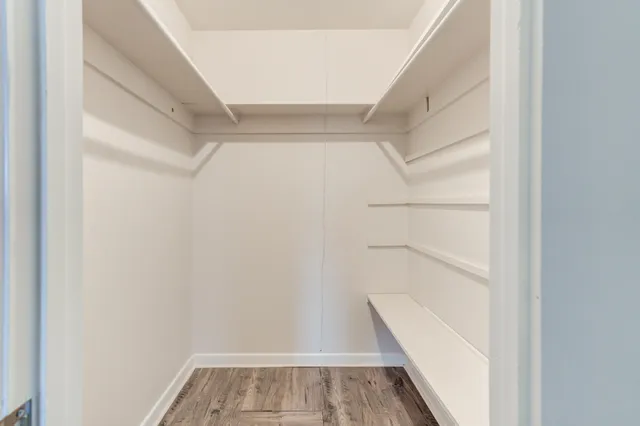 a view of a backyard of the house