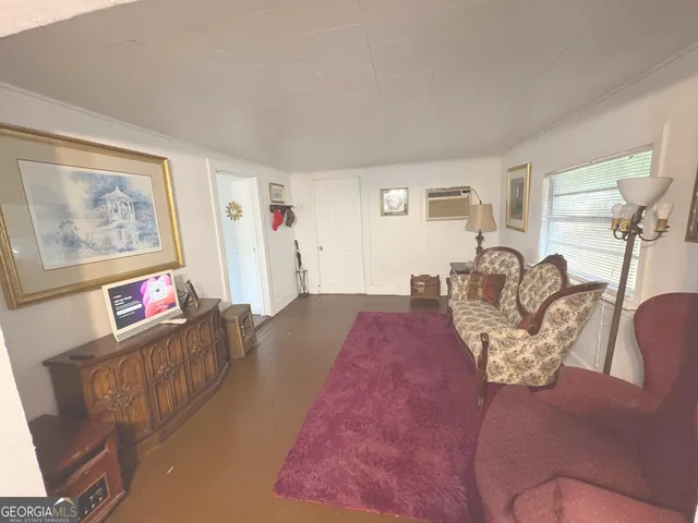 a room with furniture and a chandelier