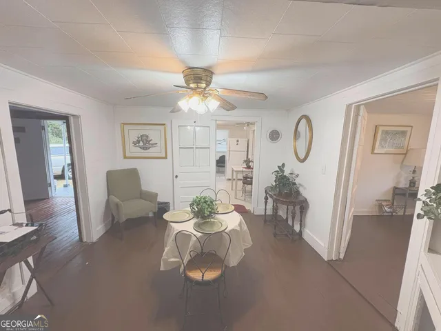 a view of a livingroom with a furniture