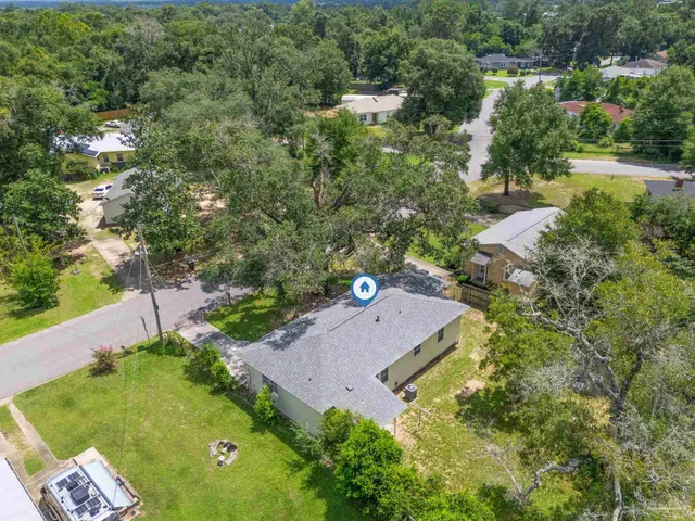 a view of a garden with wooden floor