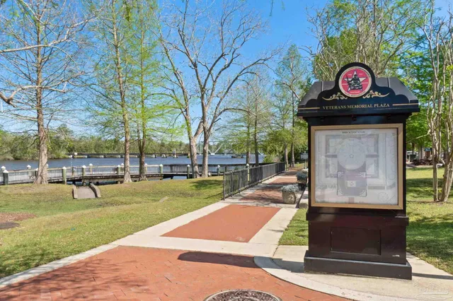 a view of swimming pool with a yard
