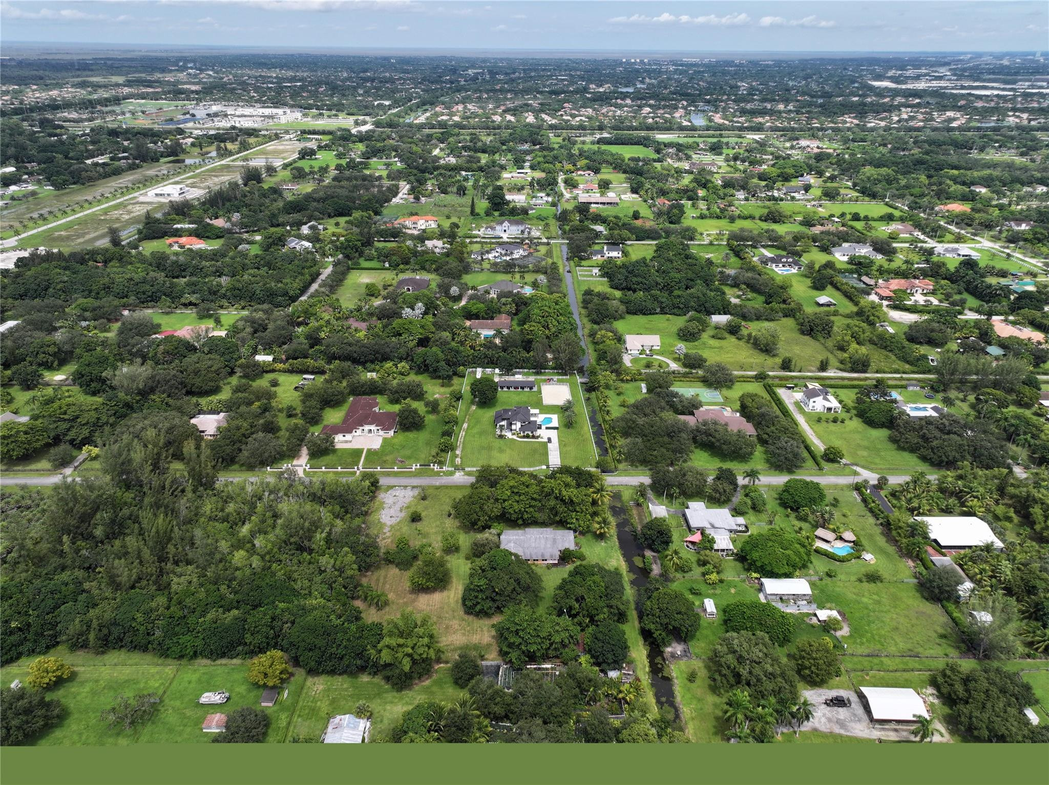18100 Southwest 55th Street Southwest Ranches, FL 33331 - Photo 14 of 16 an aerial view of a city