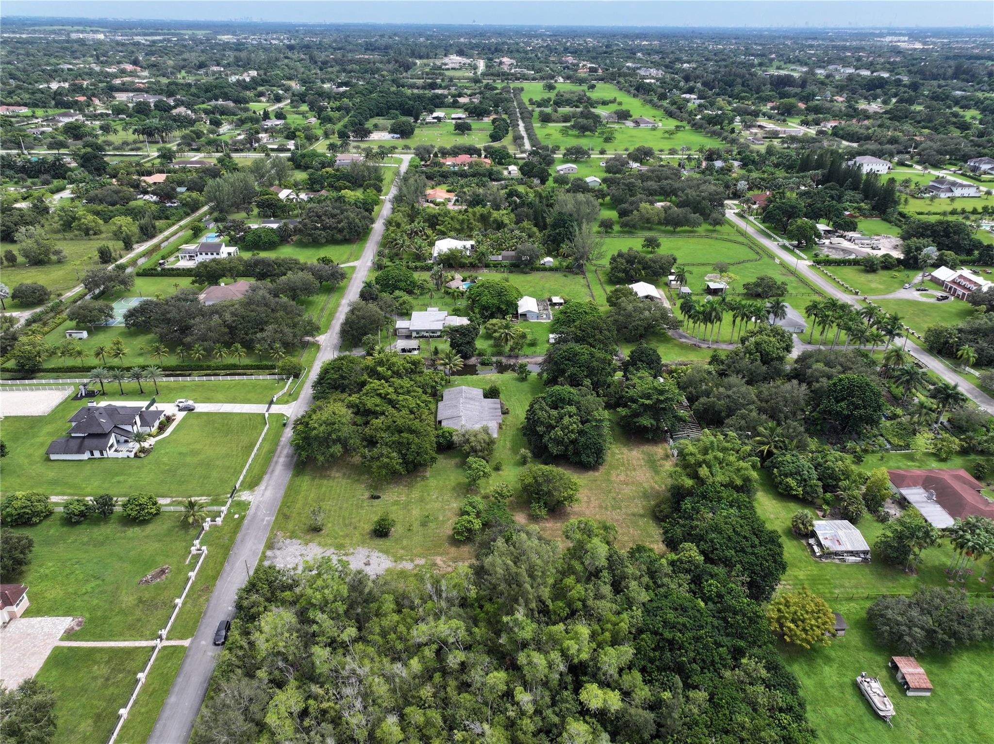 18100 Southwest 55th Street Southwest Ranches, FL 33331 - Photo 4 of 16 an aerial view of residential houses with outdoor space