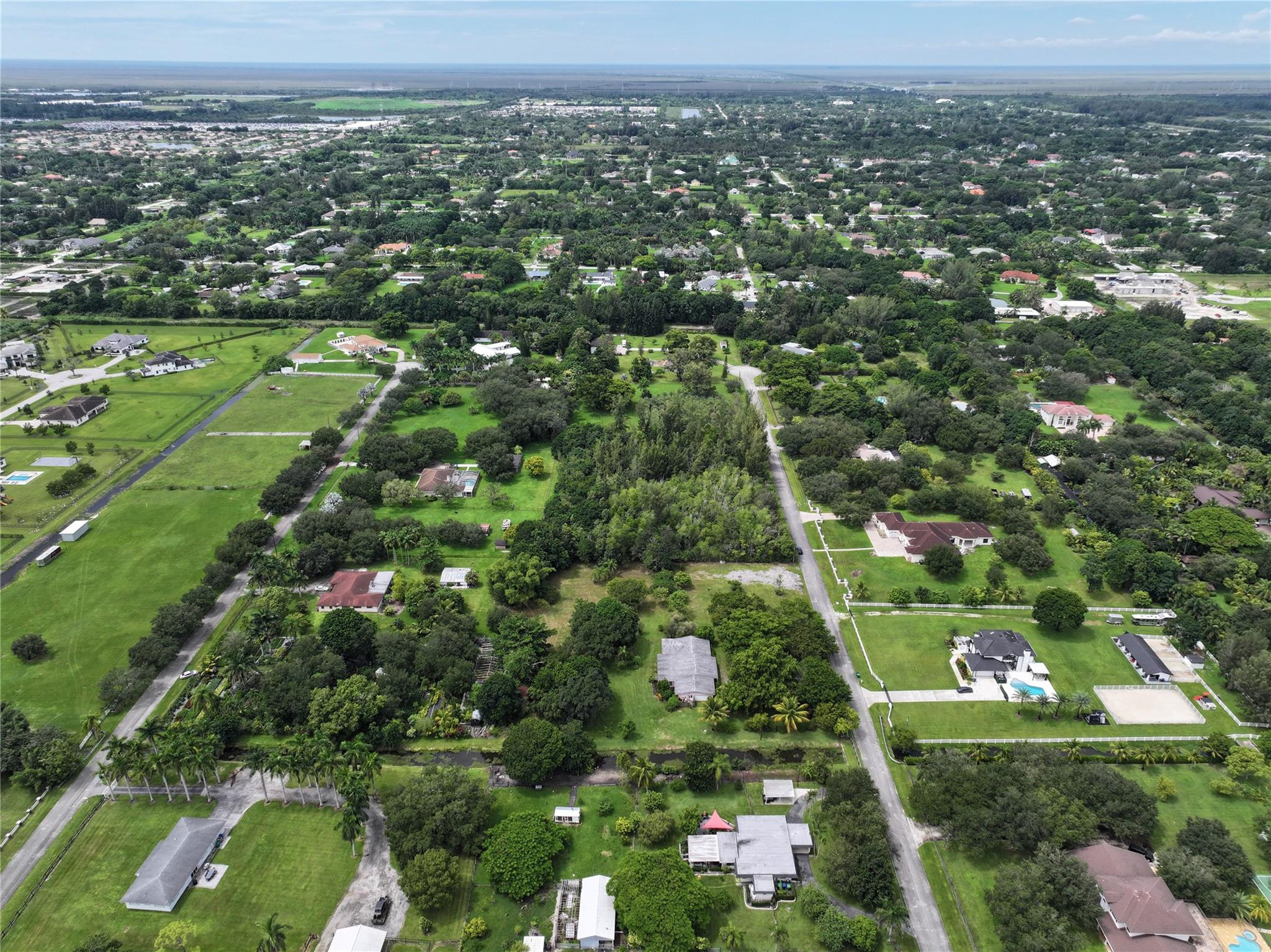 18100 Southwest 55th Street Southwest Ranches, FL 33331 - Photo 8 of 16 an aerial view of a houses with a yard