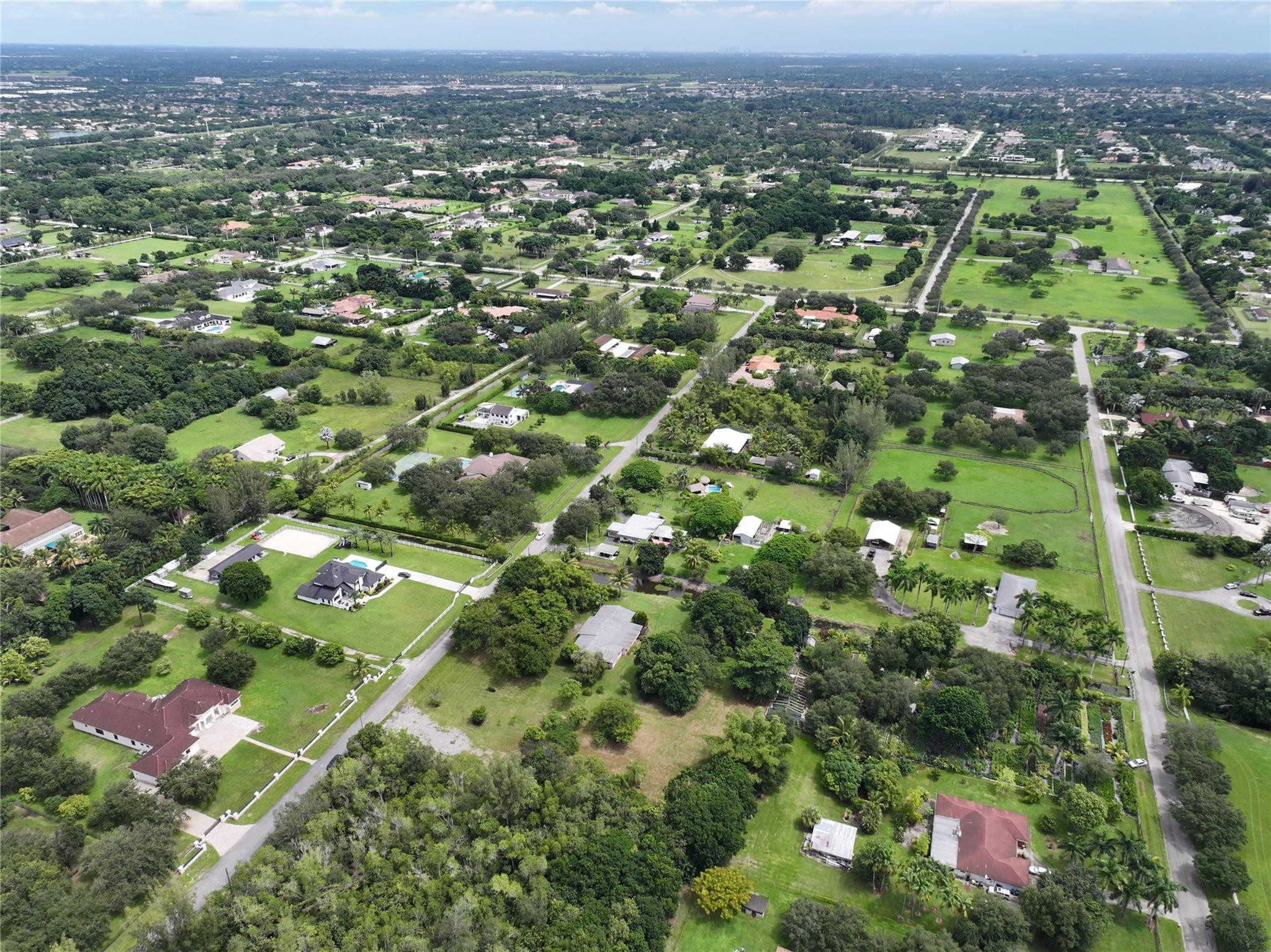 18100 Southwest 55th Street Southwest Ranches, FL 33331 - Photo 9 of 16 an aerial view of multiple house