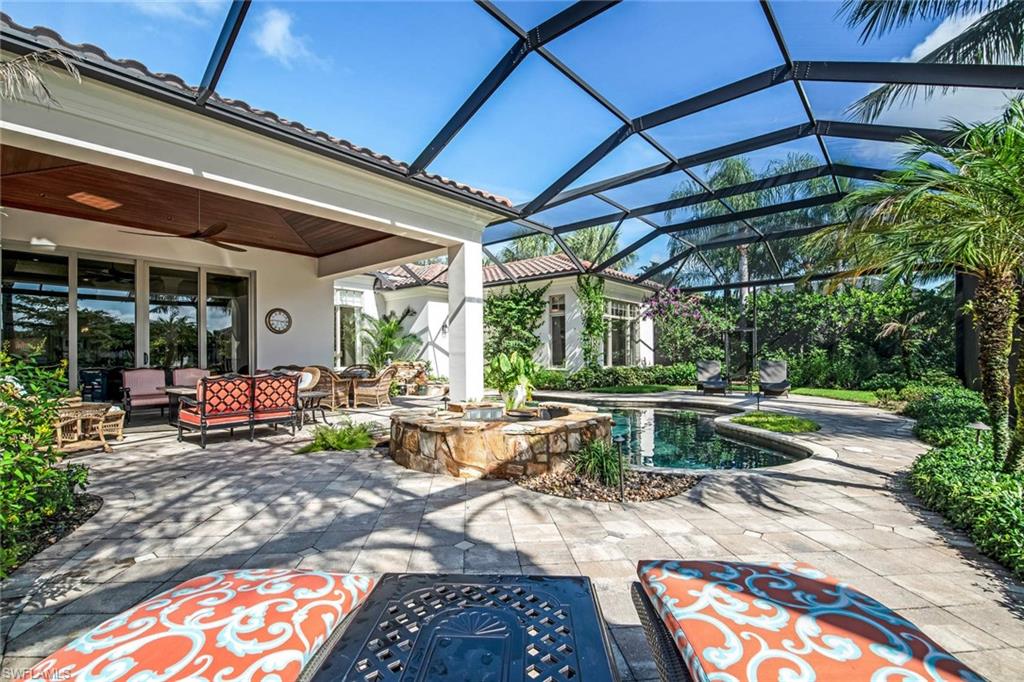 2220 Miramonte Court Naples, FL 34105 - Photo 30 of 35 a view of a chairs and table in the patio