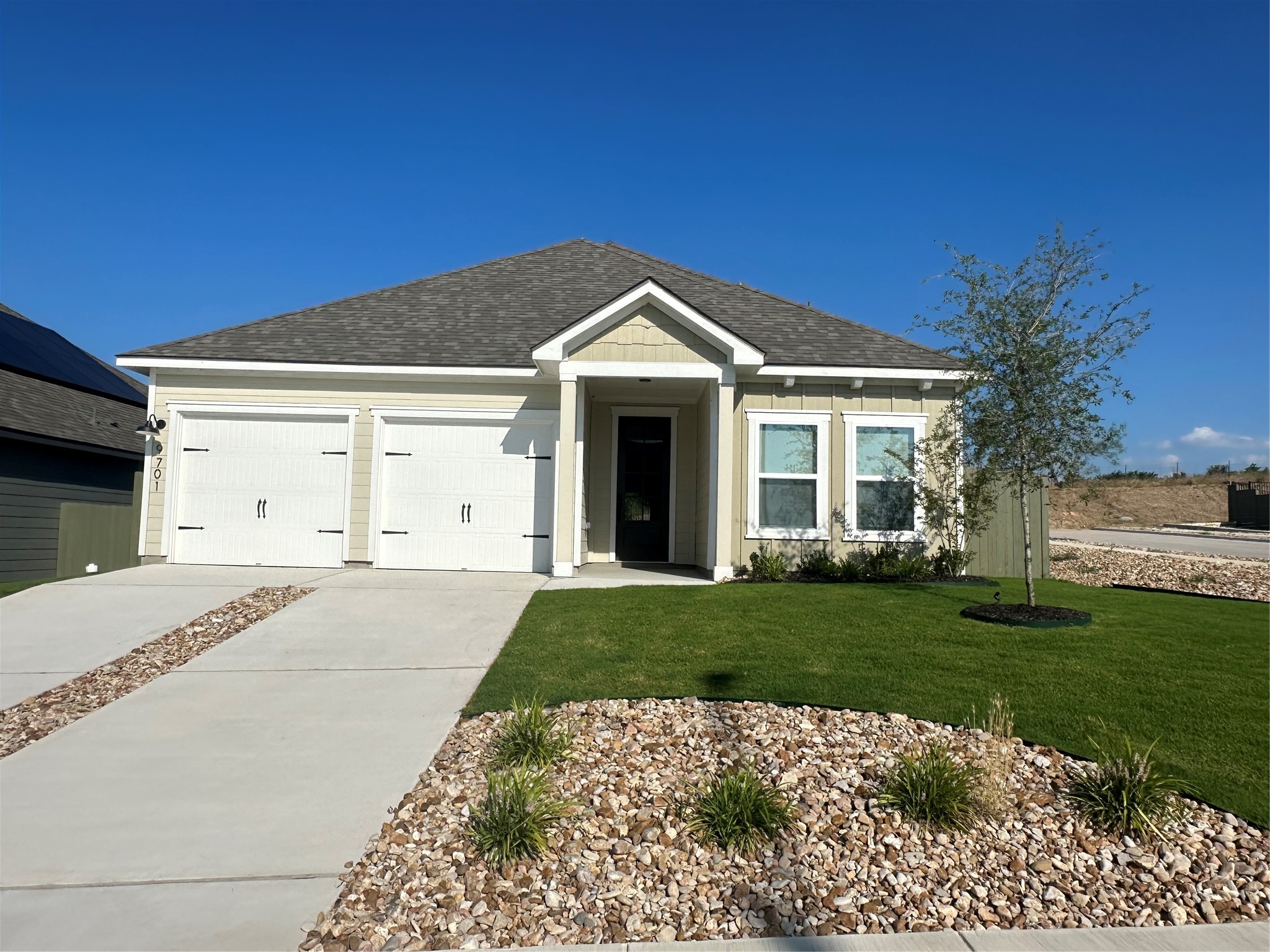 9701 Gladsome Path Manor Manor, TX 78653 - Photo 1 of 1 The spacious and inviting single-story Kendall plan on corner lot with green belt views in the top-tier master plan community, Whisper Valley.