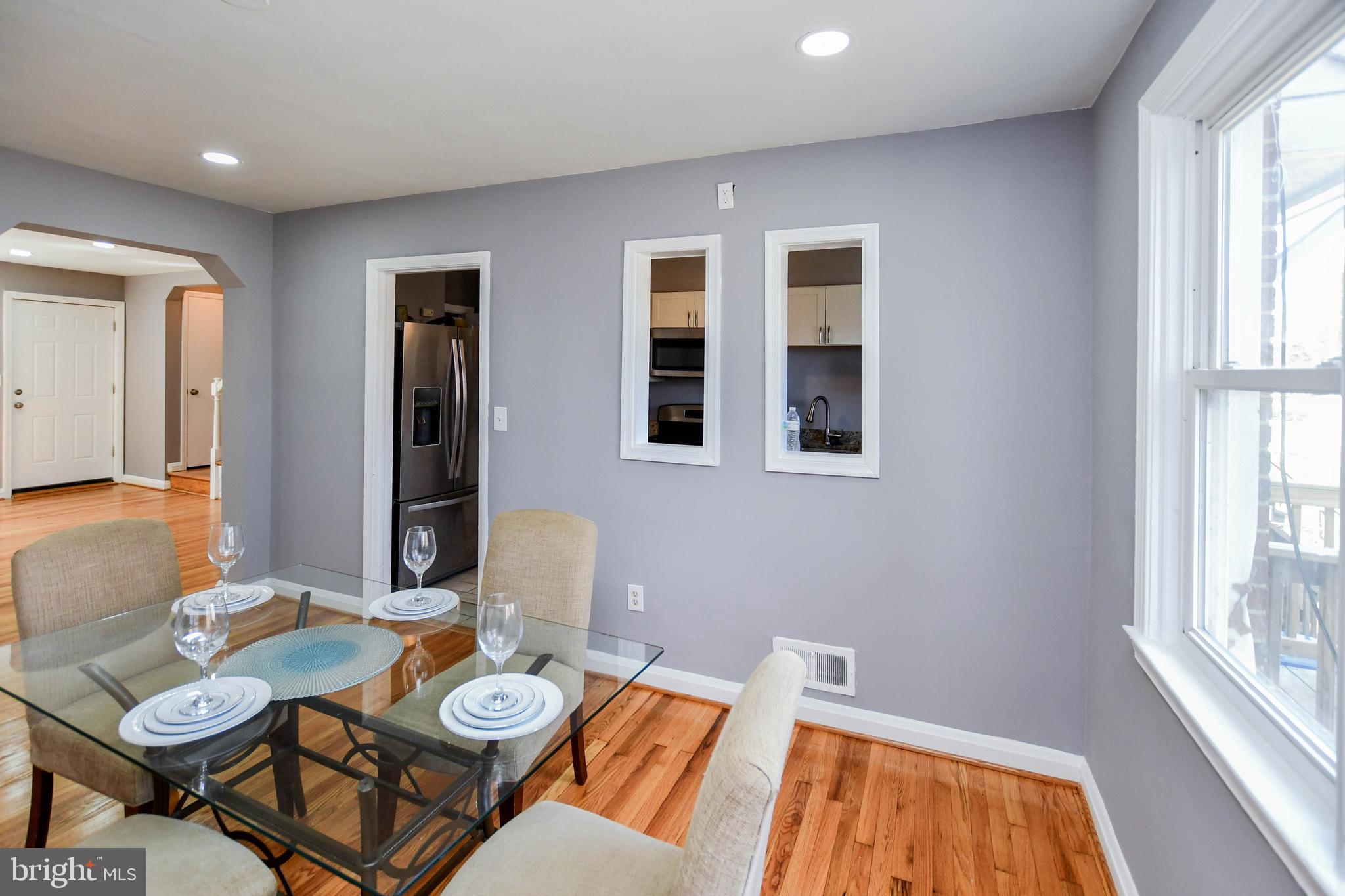 1028 Evesham Avenue Baltimore, MD 21212 - Photo 14 of 49 a view of a dining room with furniture and wooden floor