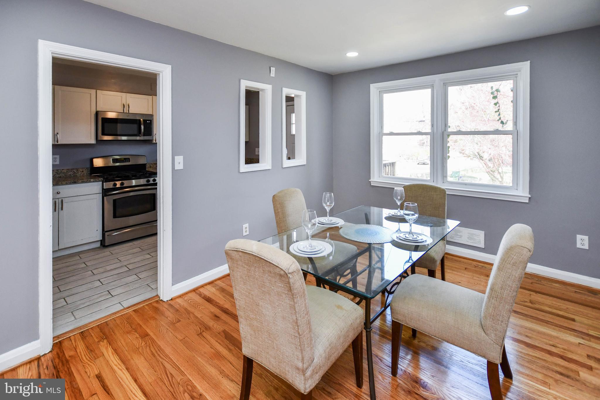 1028 Evesham Avenue Baltimore, MD 21212 - Photo 15 of 49 a view of a dining room with furniture