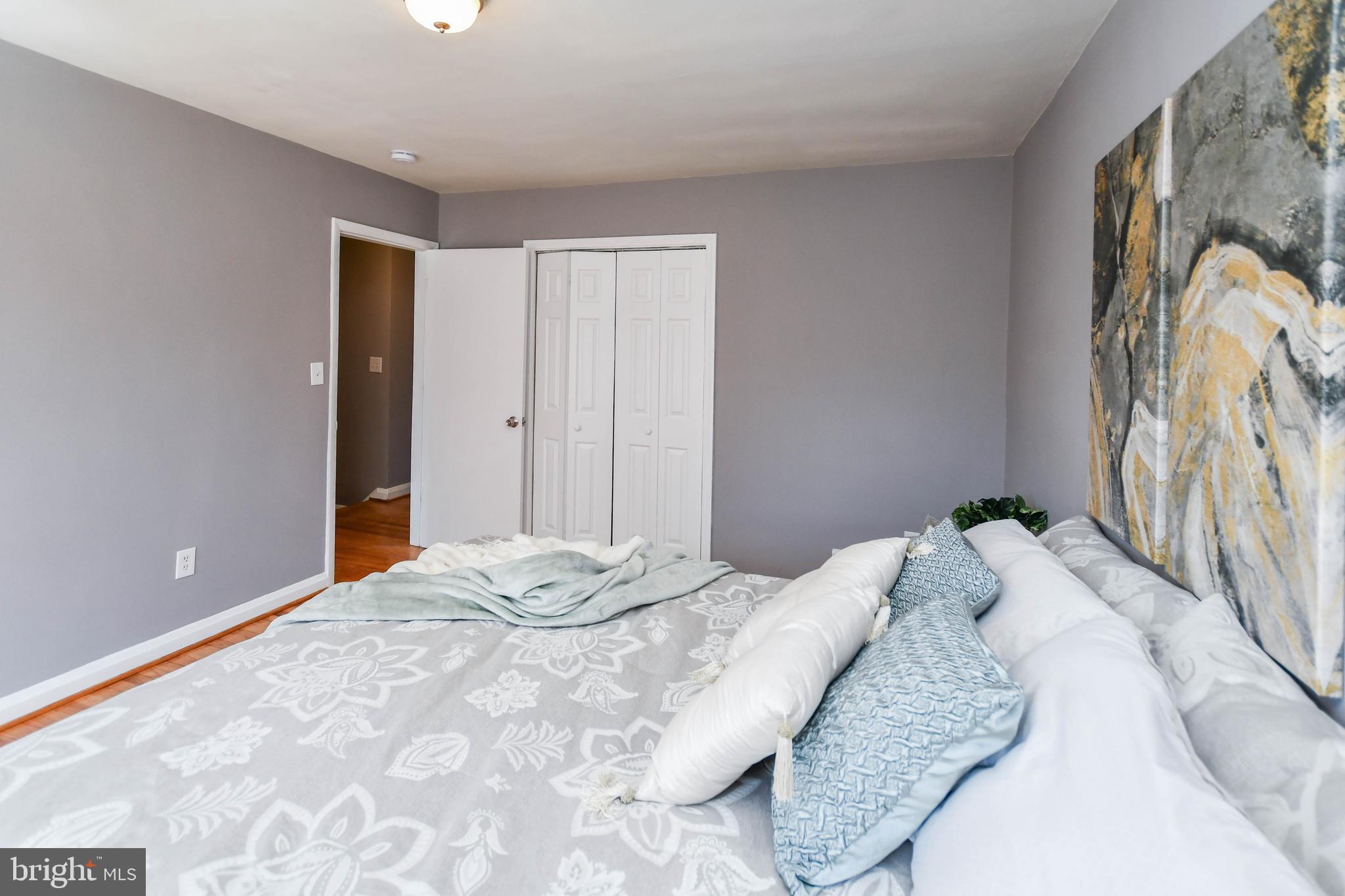 1028 Evesham Avenue Baltimore, MD 21212 - Photo 26 of 49 a bedroom with a bed and a window