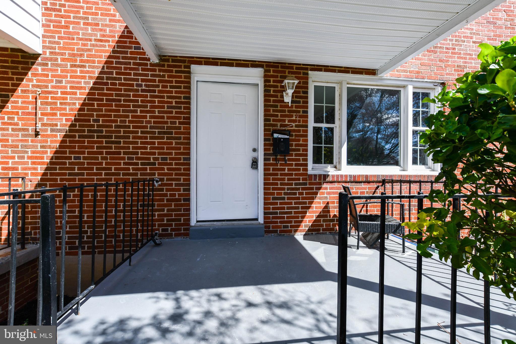1028 Evesham Avenue Baltimore, MD 21212 - Photo 6 of 49 a view of a balcony with chairs