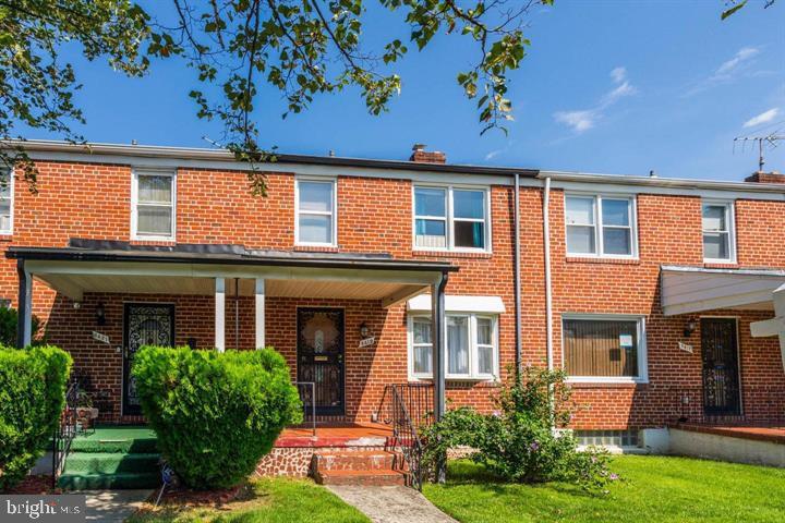 5419 Sagra Road Baltimore, MD 21239 - Photo 5 of 5 Charming brick townhouse with greenery.