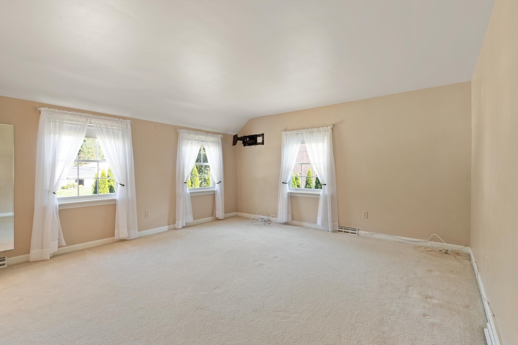 10 Prancing Road Chelmsford, MA 01824 - Photo 27 of 38 an empty room with windows and closet