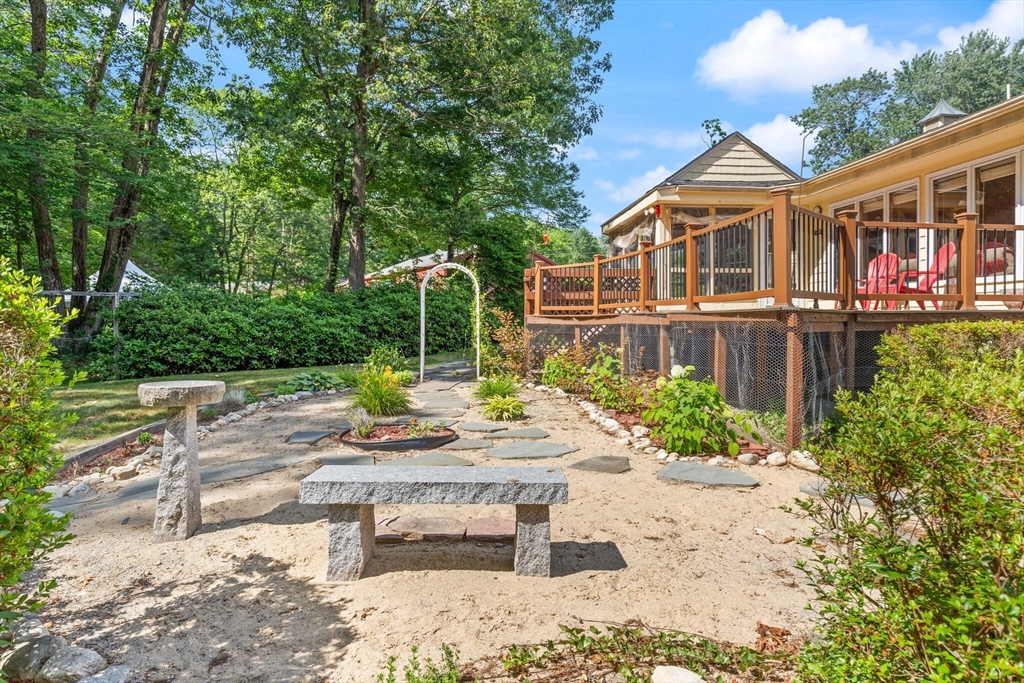 10 Prancing Road Chelmsford, MA 01824 - Photo 37 of 38 a view of a house with backyard and sitting area