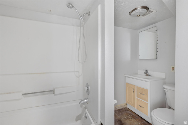 395 North 400 West Logan, UT 84321 - Photo 28 of 48 Bathroom featuring a white shower-over-tub combination with a chrome showerhead and faucet