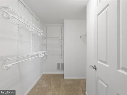 a bathroom with a sink double vanity and a mirror