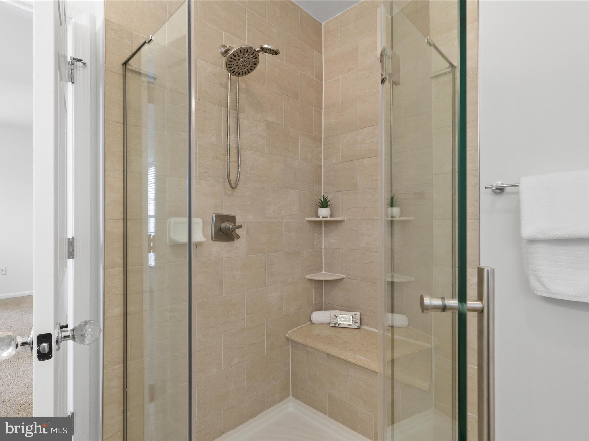 14592 Kylewood Way Gainesville, VA 20155 - Photo 24 of 60 a bathroom with a shower and toilet