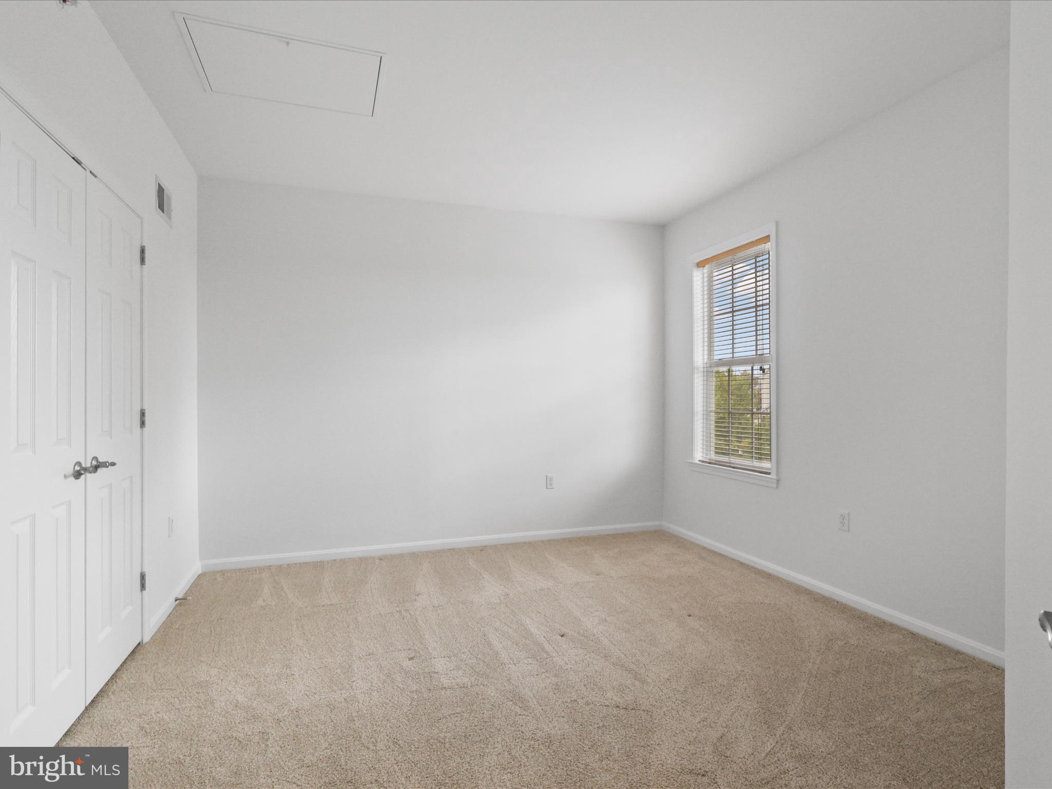 14592 Kylewood Way Gainesville, VA 20155 - Photo 26 of 60 a view of an empty room with a window