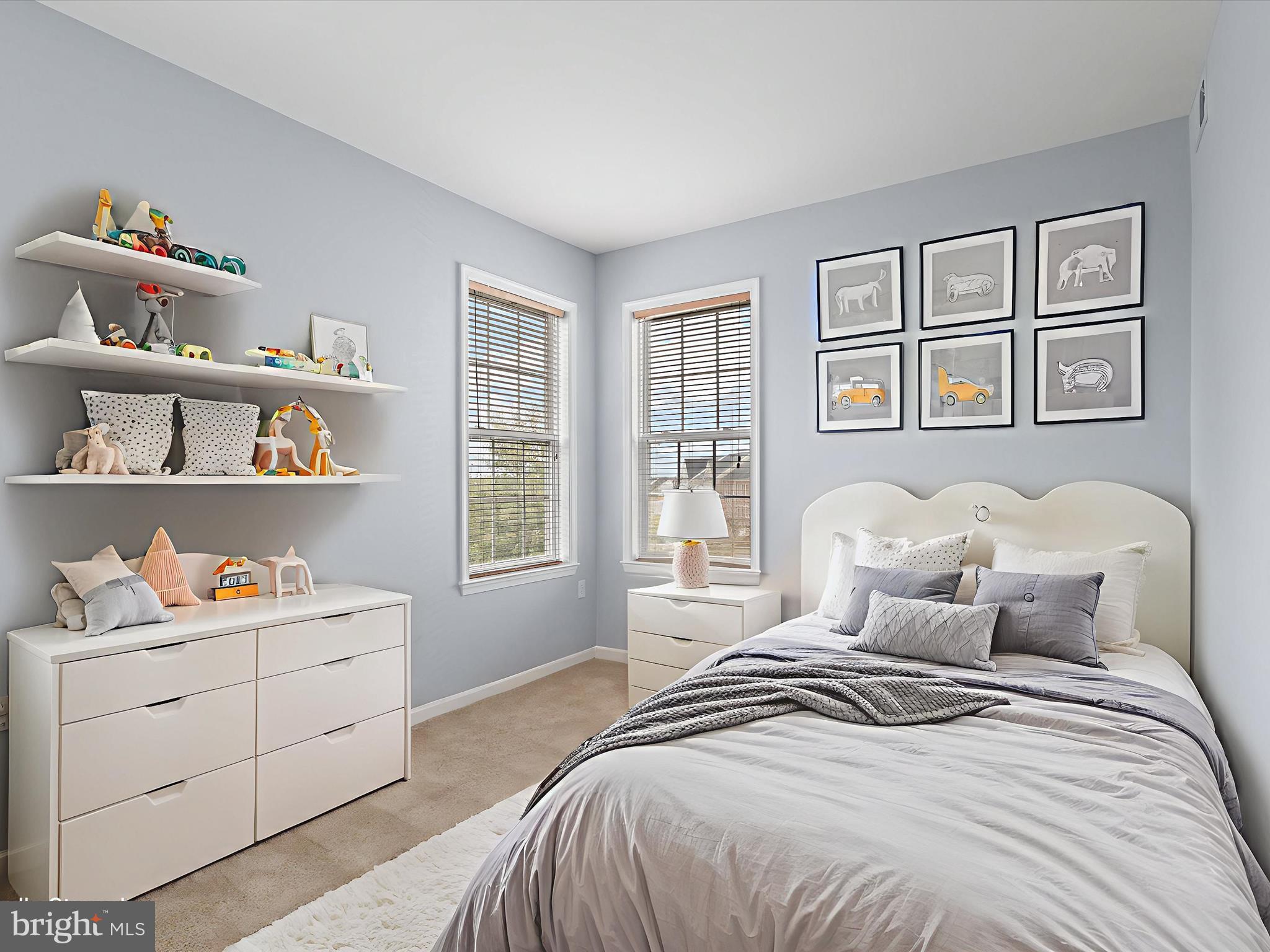 14592 Kylewood Way Gainesville, VA 20155 - Photo 27 of 60 a bedroom with a bed and a window