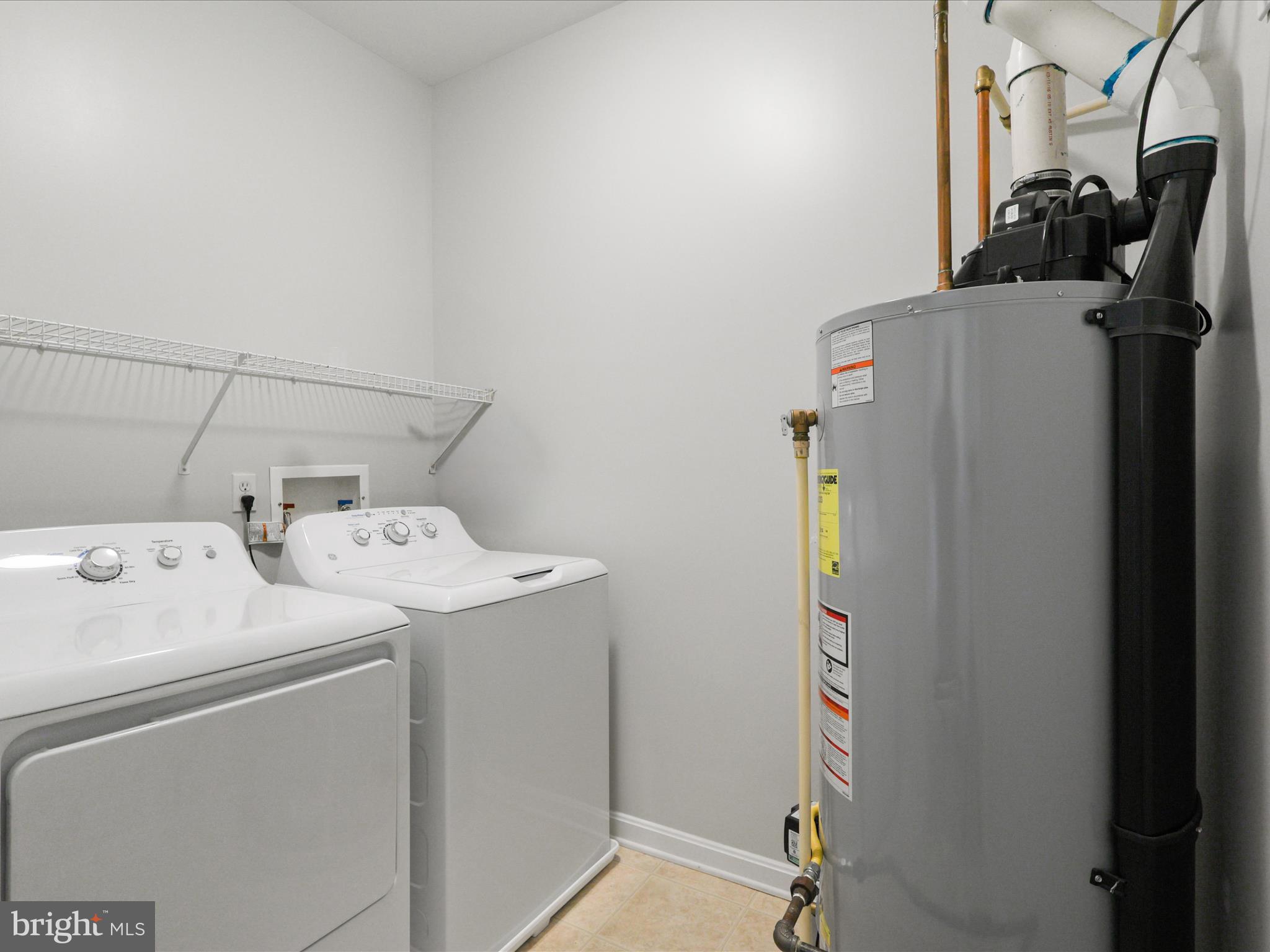 14592 Kylewood Way Gainesville, VA 20155 - Photo 32 of 60 a utility room with dryer and washer