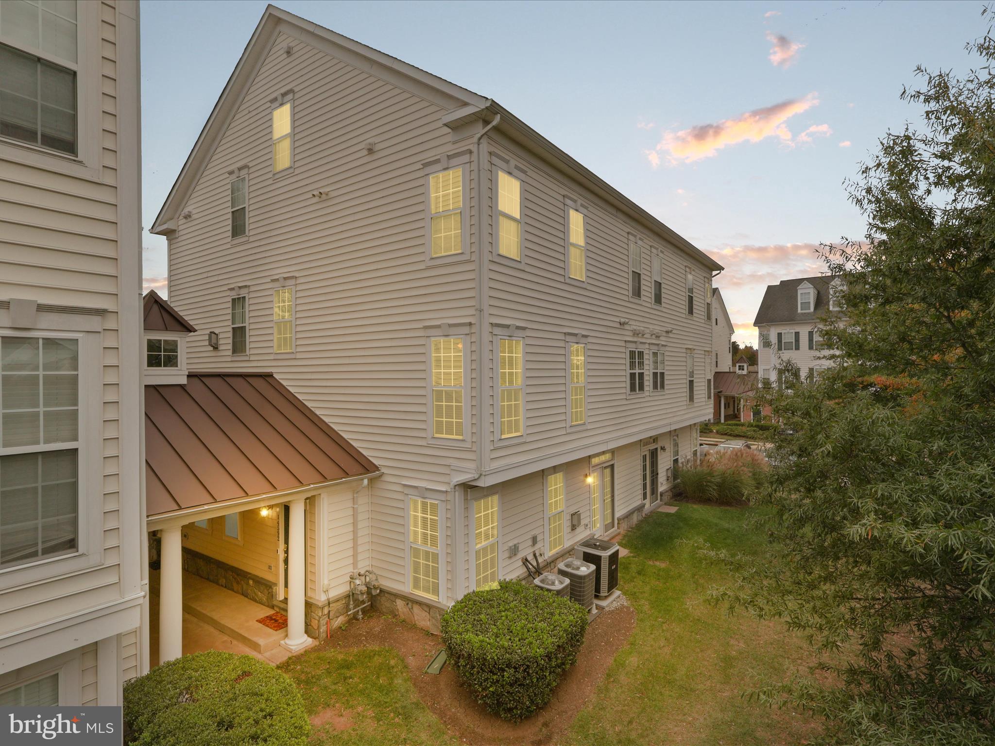 14592 Kylewood Way Gainesville, VA 20155 - Photo 37 of 60 a front view of a house with plants
