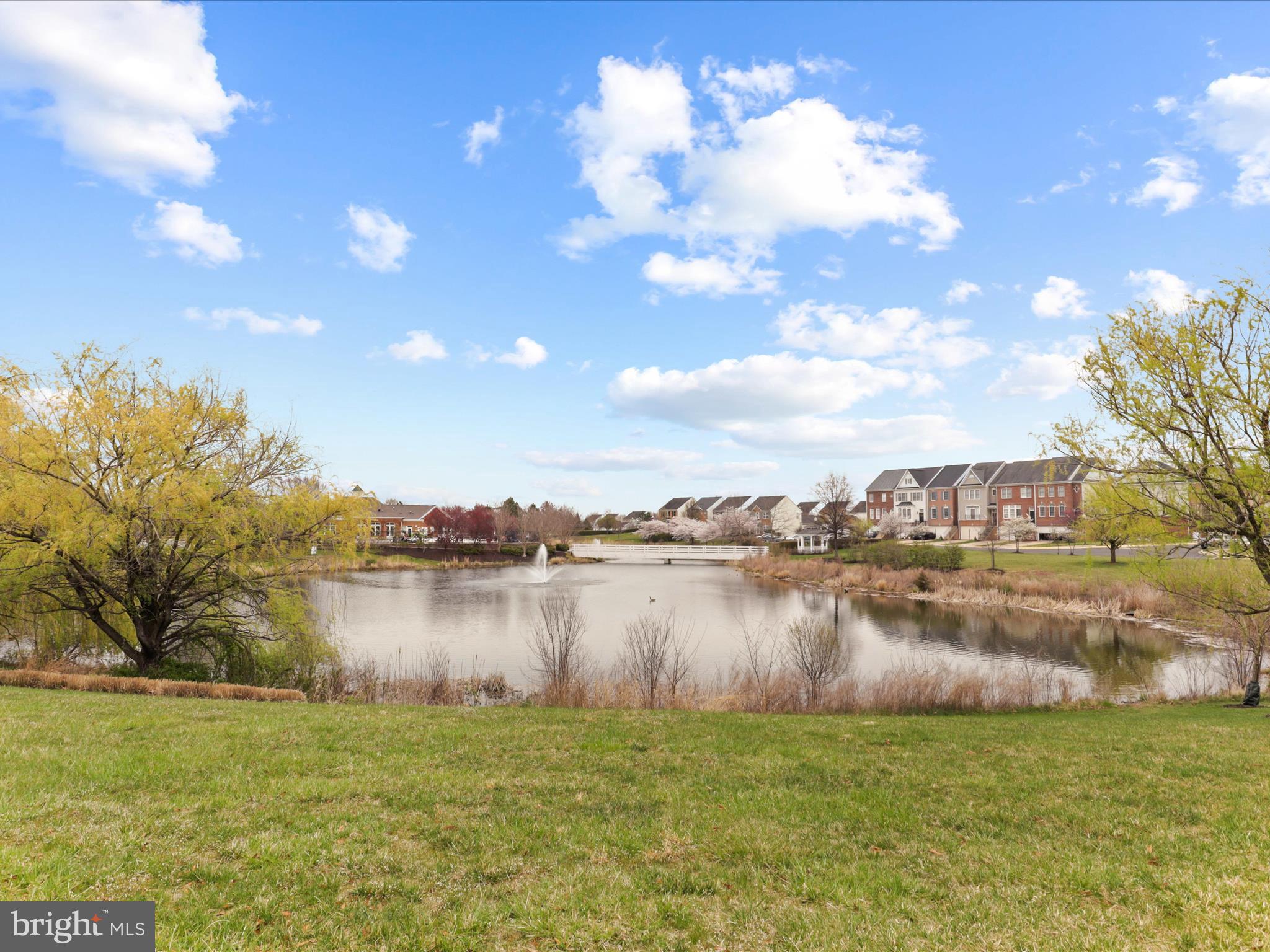 14592 Kylewood Way Gainesville, VA 20155 - Photo 41 of 60 a view of a lake with houses in the back