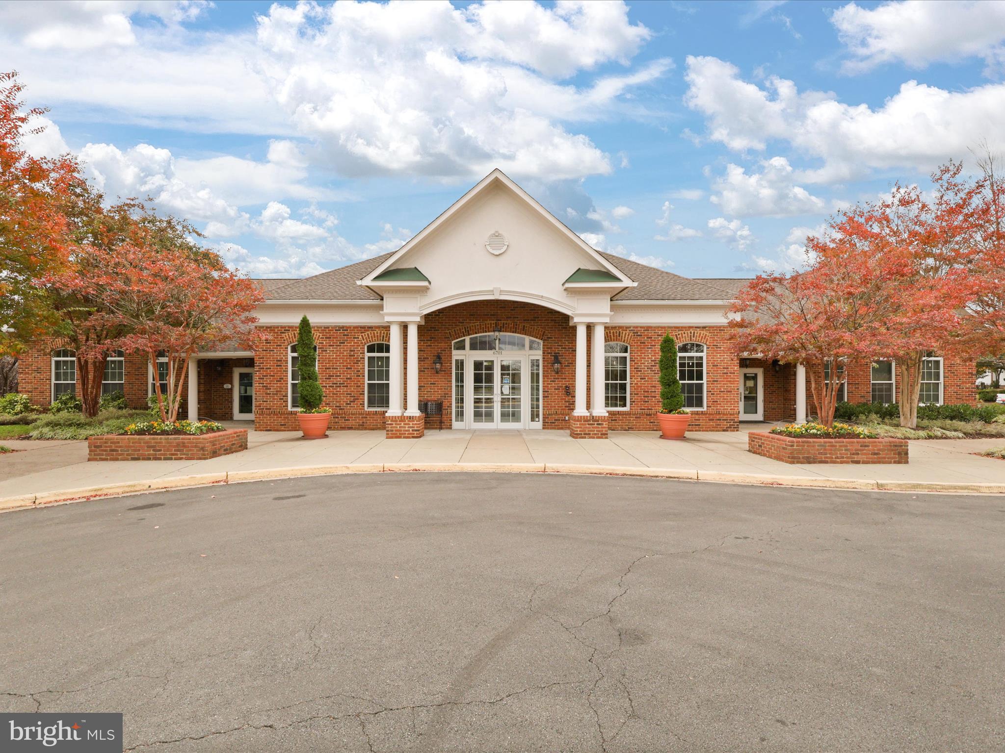 14592 Kylewood Way Gainesville, VA 20155 - Photo 44 of 60 front view of a house with a street