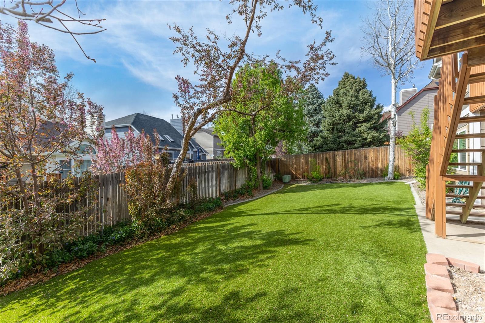 9407 Harvard Drive Highlands Ranch, CO 80130 - Photo 34 of 48 a view of a backyard