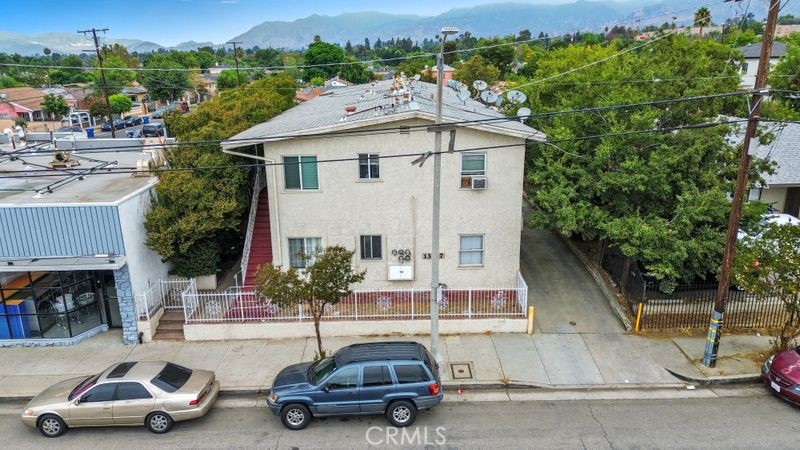 13277 Maclay Street San Fernando, CA 91340 - Photo 1 of 1 a car parked in front of a house