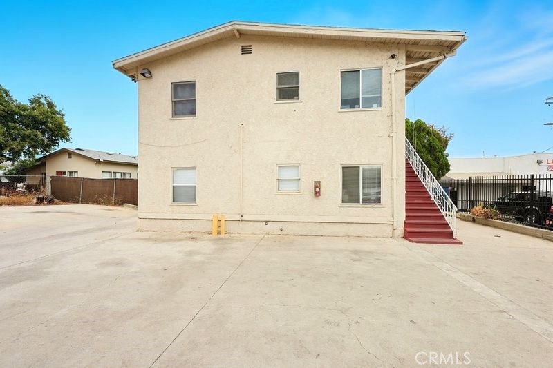 13277 Maclay Street San Fernando, CA 91340 - Photo 6 of 10 a view of a house with a yard