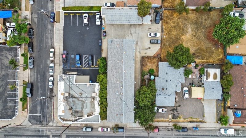 13277 Maclay Street San Fernando, CA 91340 - Photo 9 of 10 front view of a house with a street