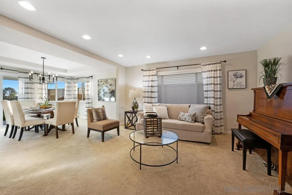 1545 Calle Ryan Encinitas, CA 92024 - Photo 17 of 63 a living room with furniture and a piano