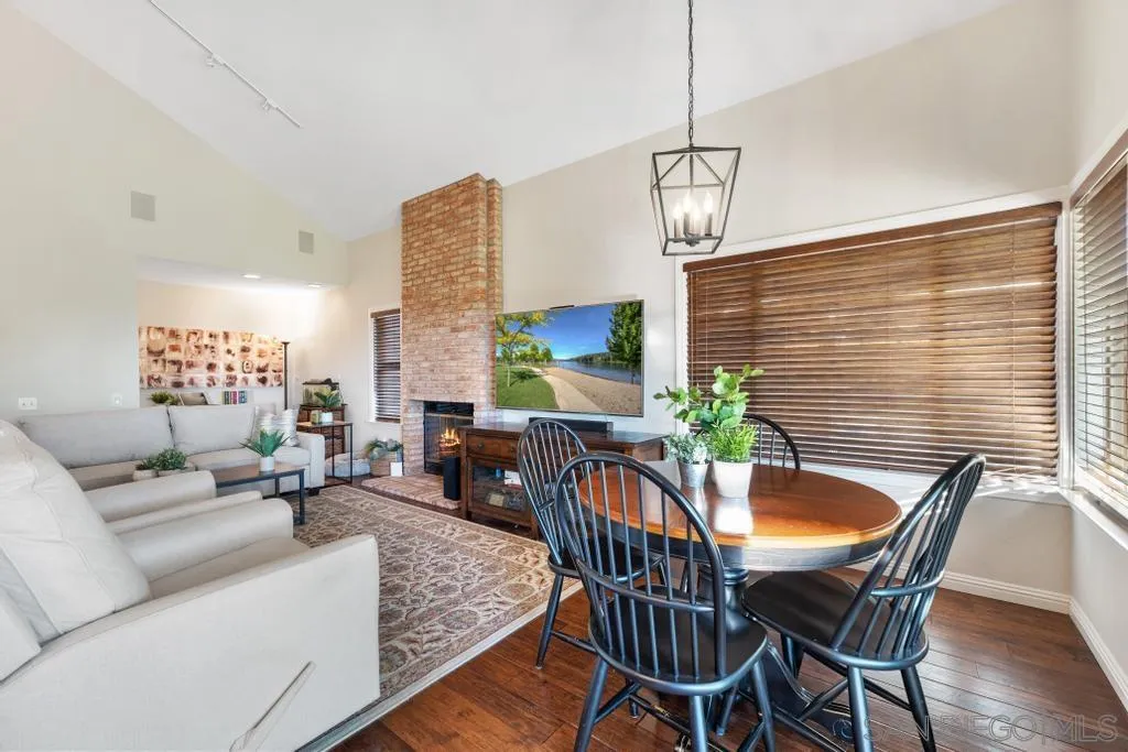 1545 Calle Ryan Encinitas, CA 92024 - Photo 26 of 63 a living room with furniture and a chandelier