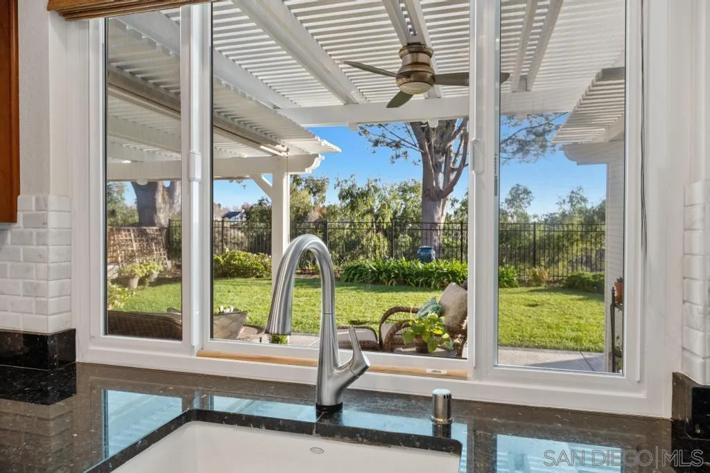 1545 Calle Ryan Encinitas, CA 92024 - Photo 33 of 63 a view of a porch with a bench
