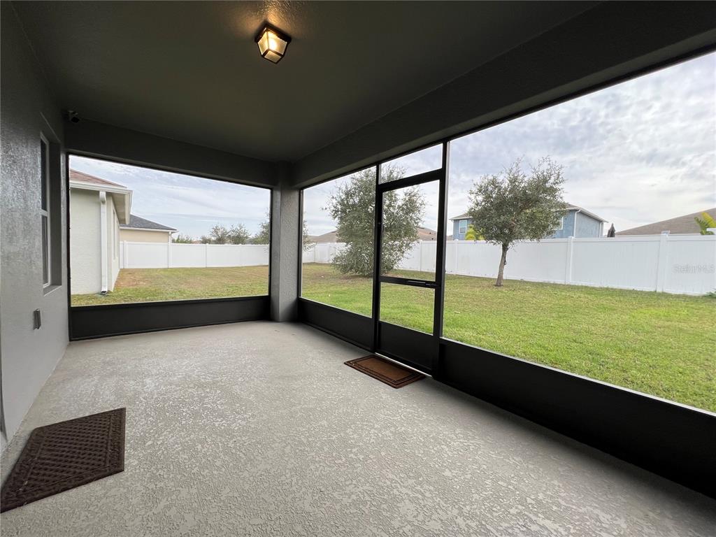1756 Brockridge Road Kissimmee, FL 34744 - Photo 23 of 26 a view of an outdoor space with a floor to ceiling window