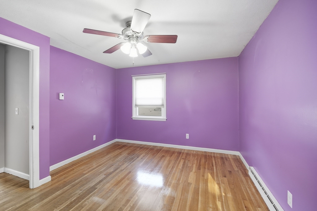 794 Homestead Avenue Holyoke, MA 01040 - Photo 18 of 34 a view of empty room with wooden floor