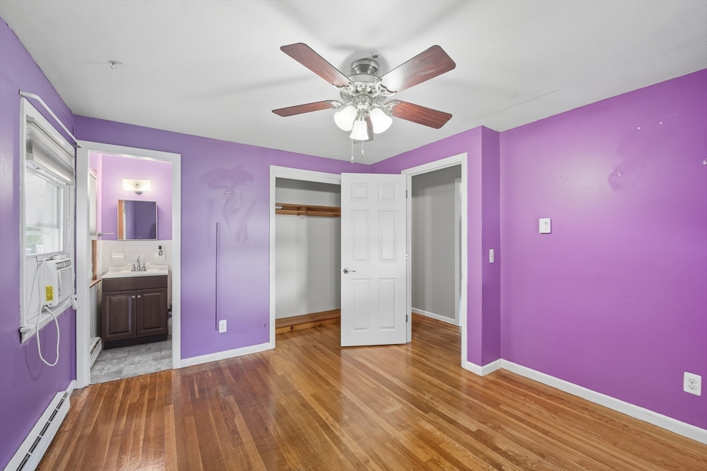 794 Homestead Avenue Holyoke, MA 01040 - Photo 20 of 34 a view of livingroom with hardwood floor and ceiling fan