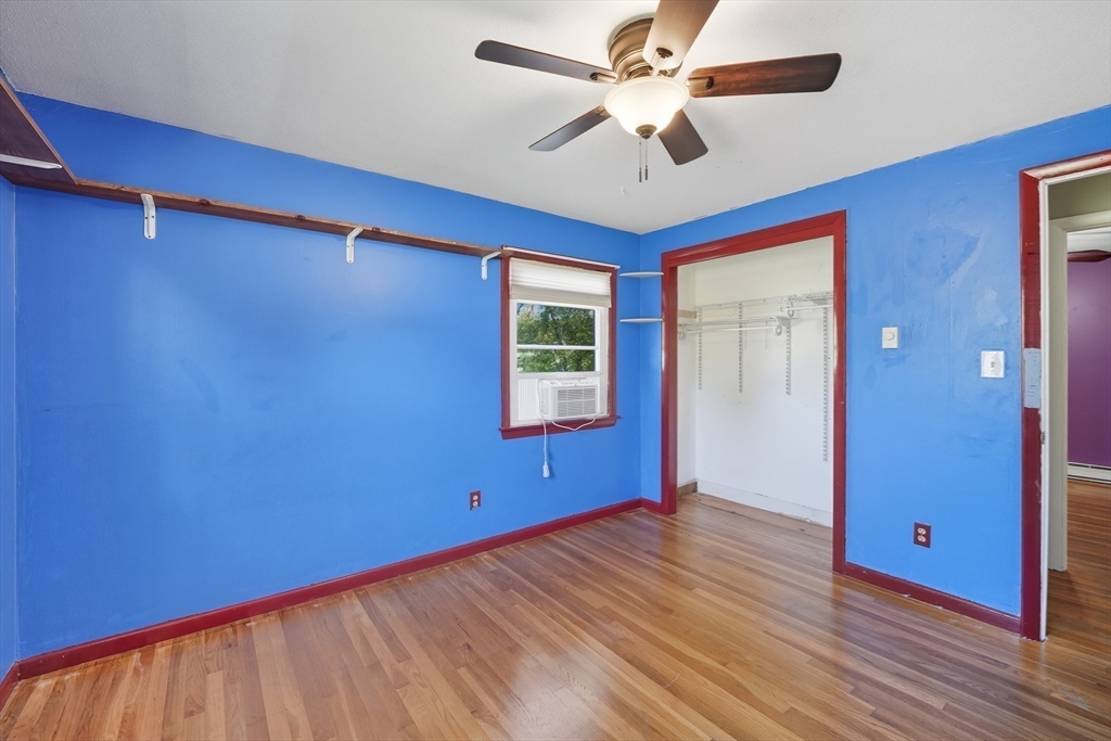 794 Homestead Avenue Holyoke, MA 01040 - Photo 23 of 34 a view of empty room with wooden floor and fan