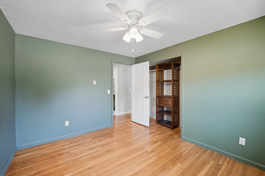 794 Homestead Avenue Holyoke, MA 01040 - Photo 25 of 34 wooden floor in an empty room with a window