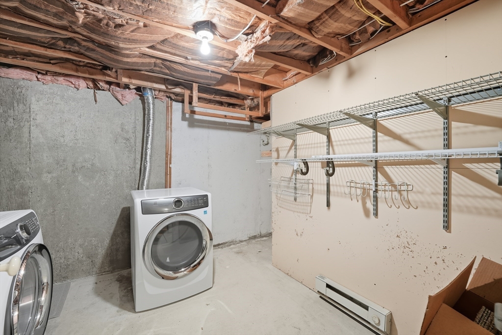 794 Homestead Avenue Holyoke, MA 01040 - Photo 33 of 34 a utility room with dryer and washer