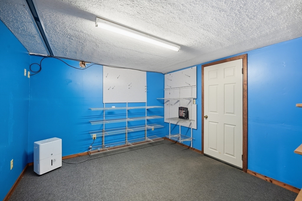 794 Homestead Avenue Holyoke, MA 01040 - Photo 34 of 34 a room with furniture and a window