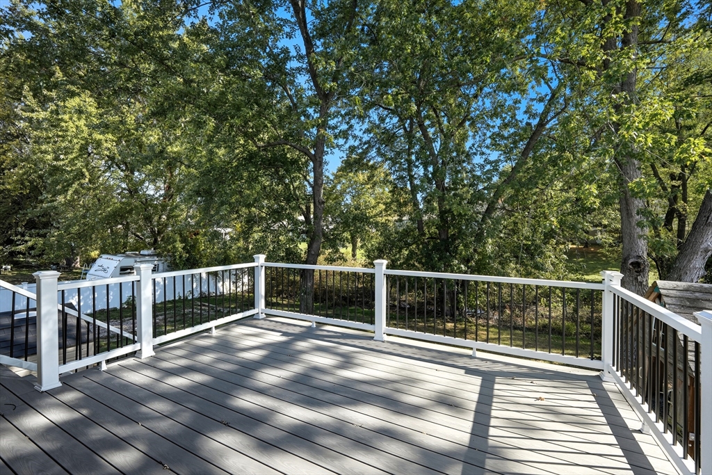 794 Homestead Avenue Holyoke, MA 01040 - Photo 9 of 34 a view of balcony with wooden floor and fence