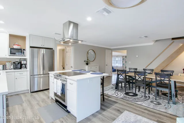 a bedroom with a bed and a lamp